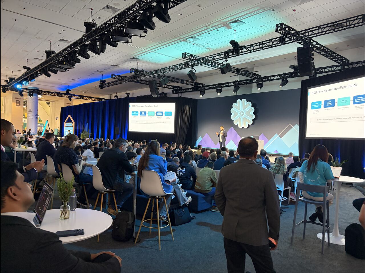 Sam Gupta on stage at a Snowflake conference